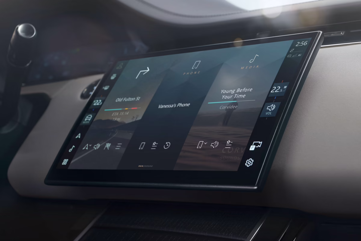 Car touchscreen dashboard displaying navigation, phone connection, and music playing, illustrating advanced vehicle technology